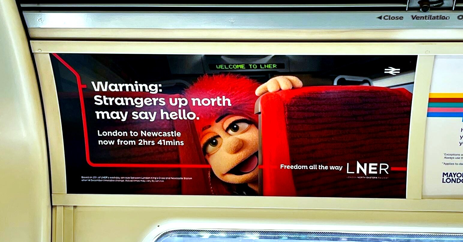Photograph of an advert on the London Underground: LNER