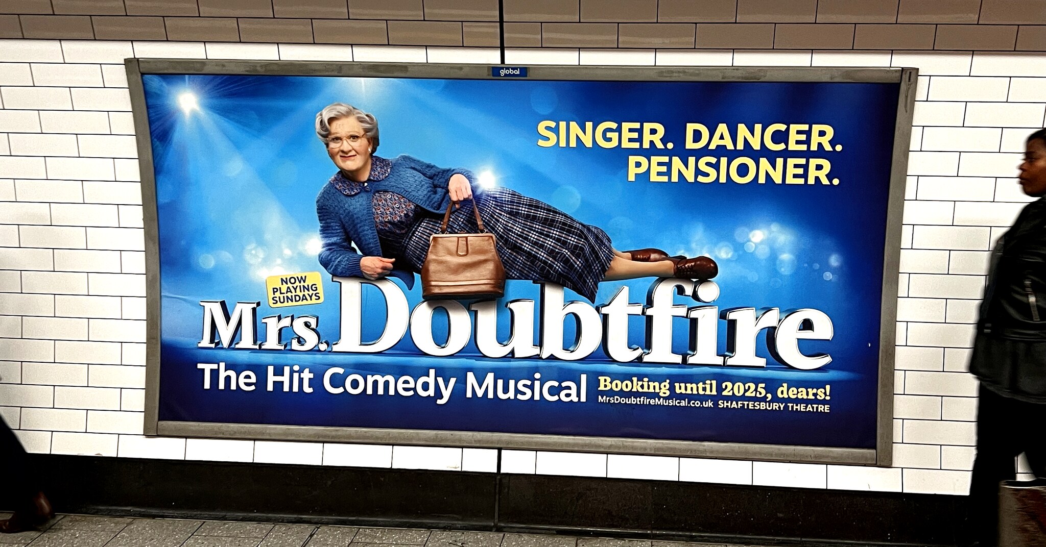 Photograph of an advert on the London Underground: Mrs Doubtfire