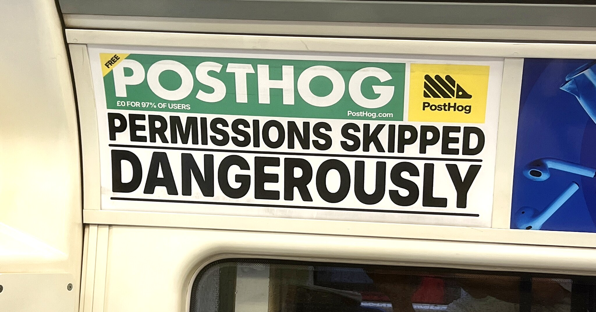 Photograph of an advert on the London Underground: PostHog